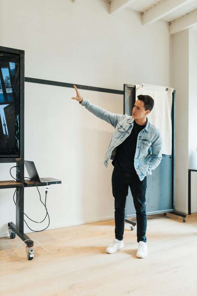 man presenting to a room