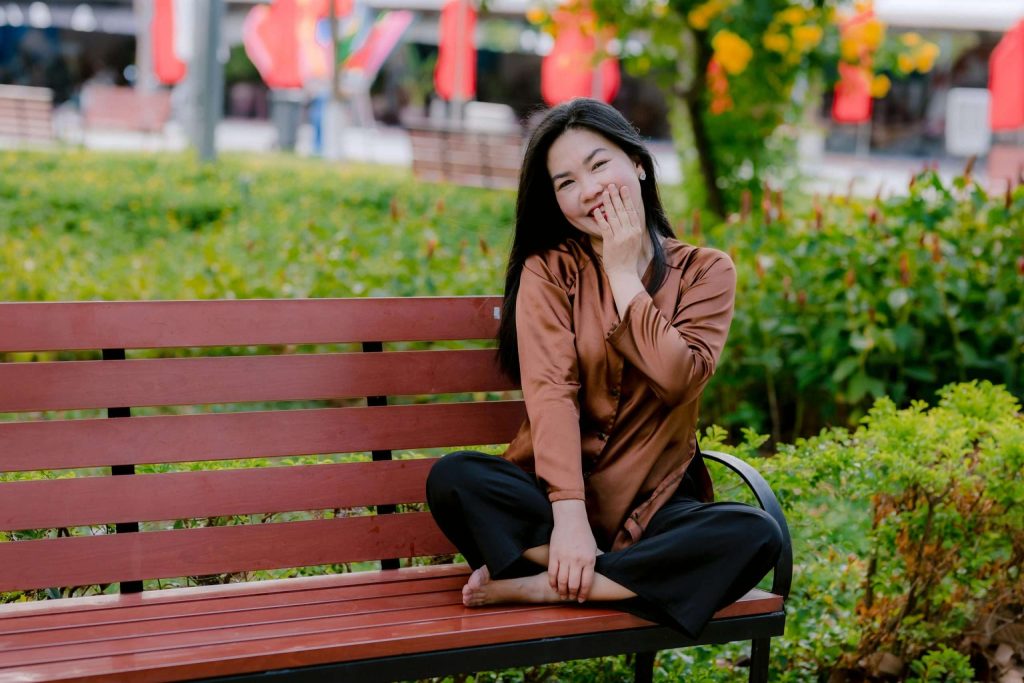 A woman sitting on a bench