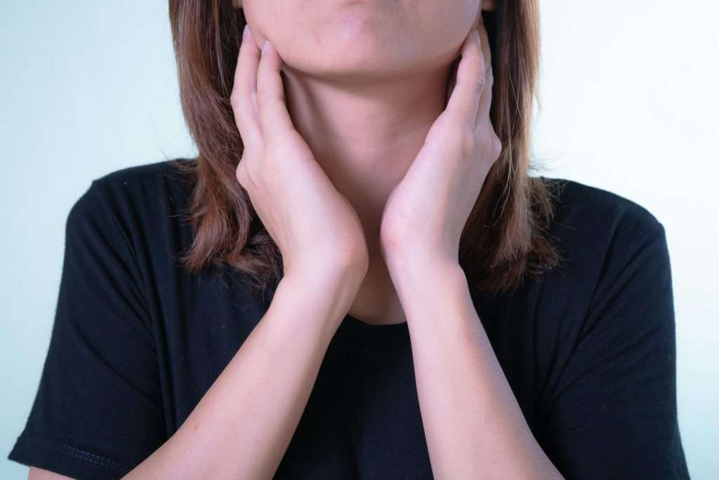 woman with a hoarse voice before a presentation